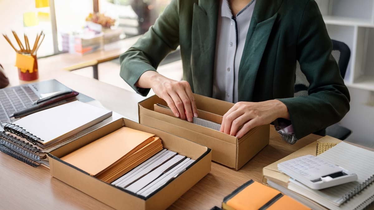 Woman Organizing Office Supplies