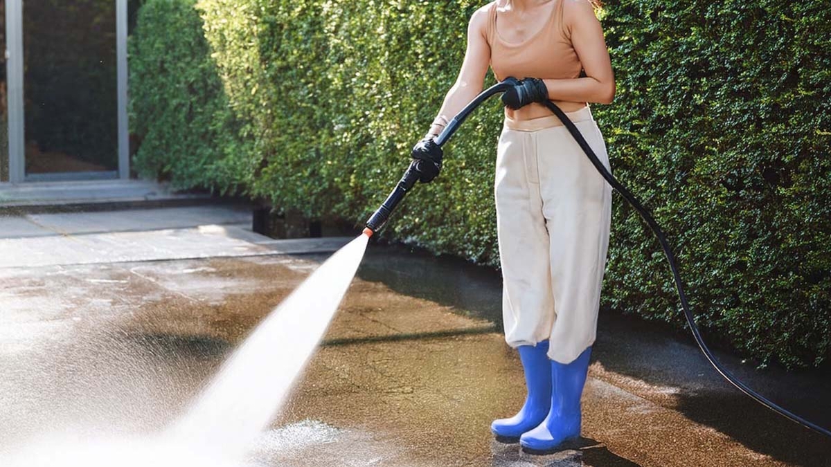 Cleaning Ground With Pressure Washer