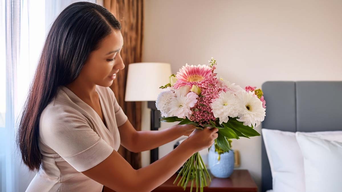 Woman Arranging Flowers