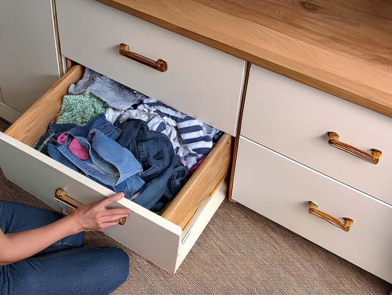 Woman Cleaning A Single Drawer